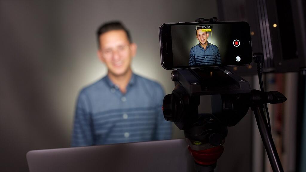 Standing in front of the camera